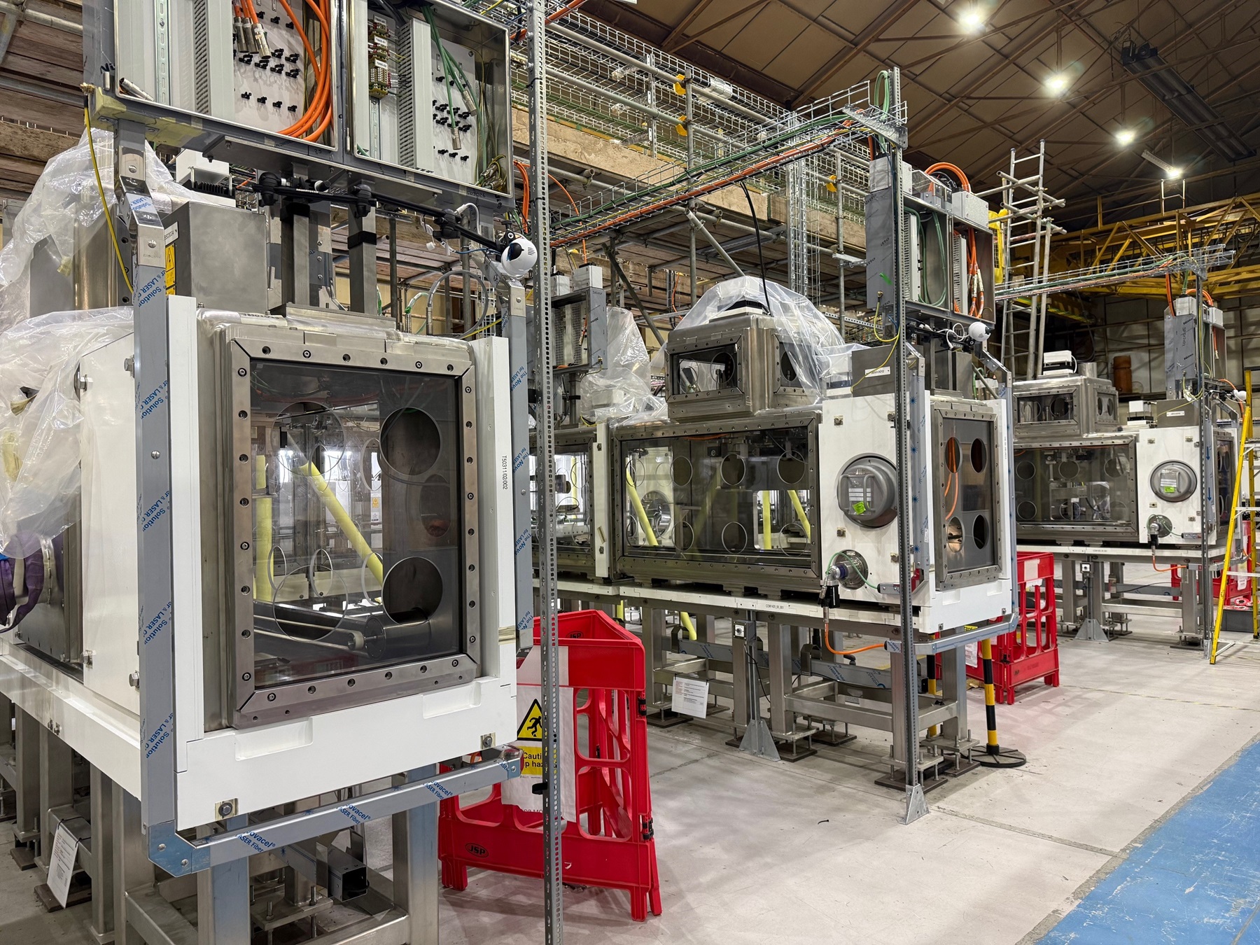 Batch furnace legs, part of the 23 meter glovebox line.